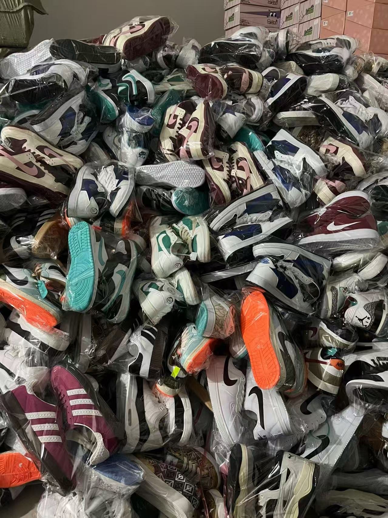 Mixed footwear inventory ready for sorting